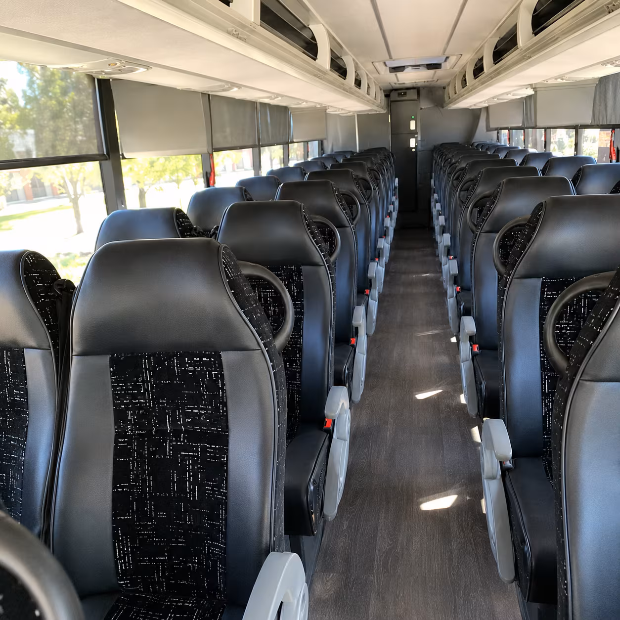 how distance mileage and route complexity affect bus rental costs in baton rouge